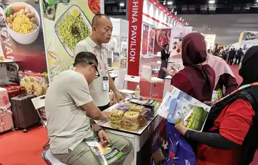 Malayziya Halal Sərgisində Dongyang Food Instant Noodle Block Malayziya Halal Sərgisində Dongyang Food Instant Noodle Block
